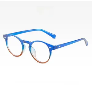 Detail of round vintage glasses frame featuring a blue and amber tea gradient finish