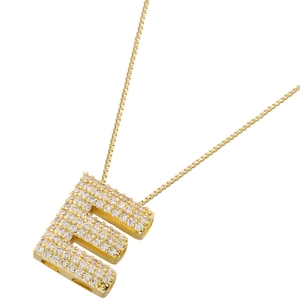 Macro shot of gold plated letter E pendant with pavé cubic zirconia on box chain