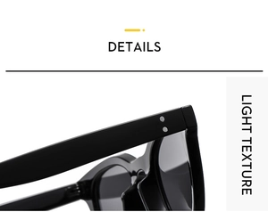 Macro detail of glossy black sunglasses showing metal hinge and light texture construction