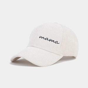 Detailed view of mama embroidery on high-quality corduroy fabric of baseball cap