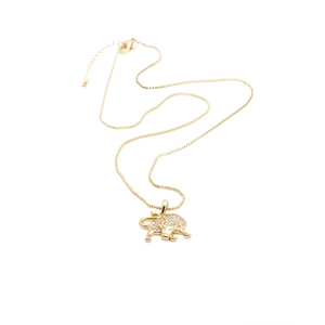 Golden Taurus bull pendant necklace with sparkling cubic zirconia on a box chain link