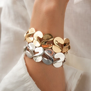 Chic metallic S-shape twisted stretch bracelet in gold and silver finish for women