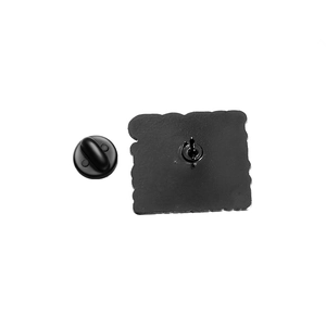 Detailed view of the black matte square wave-edged enamel pin back with secure rubber clutch