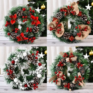 Collage of four festive Christmas pine wreaths with berries and pine cones for door decor