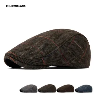 Classic tweed flat cap for men with vintage brown plaid pattern in wool blend material