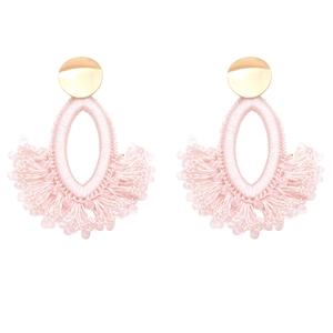 Detail of pink handmade bead fringe earrings with fan-shaped bohemian tassel design
