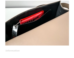 Detailed internal view of beige leather messenger bag showing storage and inner pocket