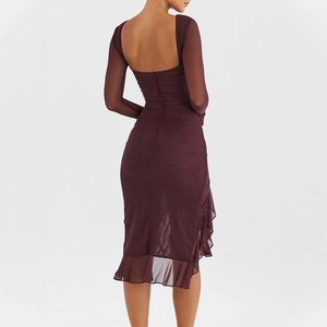 Detail of the elegant open back design with mesh stitching on this purple midi dress