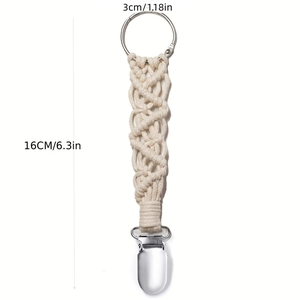 Detail view of beige woven cotton hat clip for travel bags with 16cm length measurements