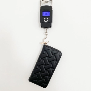 Women's black embossed PU leather long wallet with zipper and woven texture, weighing 0.160kg