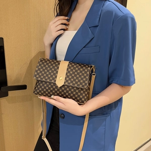Brown monogram small square crossbody bag with beige trim and adjustable shoulder strap