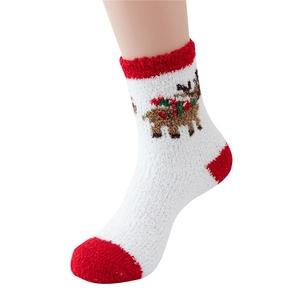 Detail of coral fleece Christmas sock featuring a reindeer pattern on a mannequin foot