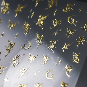 Golden fairy and star moon nail art decals with metallic gold foil stamping effect