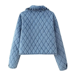 Back view of a blue quilted denim jacket featuring a diamond pattern and ruffle collar