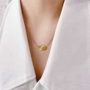 Elegant 18K gold plated titanium necklace featuring a geometric radiant pendant for women