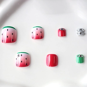 French watermelon style toe press-on nails with green stripes and rhinestones