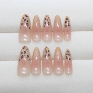 Long almond cat eye leopard print press-on nails with nude pink gradient glitter