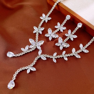 Elegant silver zirconia jewelry set with flower necklace and matching drop earrings