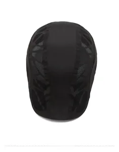Top view of black quick-dry cap showing breathable honeycomb mesh texture and stitching