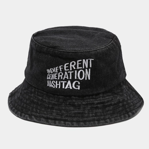 Fashionable black washed denim bucket hat featuring white letter embroidery on the front