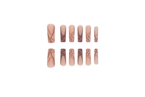 Long coffin press-on nails with matte nude pink base, brown heart patterns and wavy lines