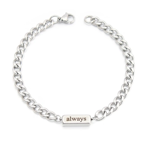 Detailed close-up of a silver chain bracelet featuring a rectangular bar engraved with always