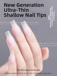 Macro view of ultra-thin matte almond false nails with natural pink translucent finish