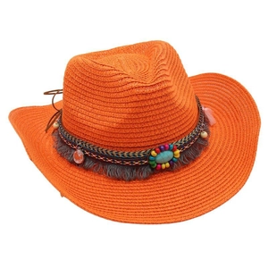 Detailed view of an orange woven straw cowboy hat with a decorative ethnic style bead band.