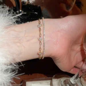 Close-up of 18k gold plated double layer flower bracelet with sparkling zircon details