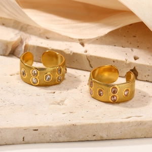 Adjustable gold titanium steel ring with vertical stripes and oval zircon crystals