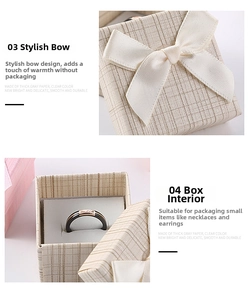 Square beige jewelry box with bow detail showing closed and open ring storage