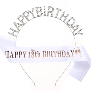 Detail of silver rhinestone 18th birthday headband and white satin shoulder sash set