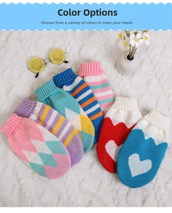 Detailed view of various colorful knitted pet sweaters with ribbed high neck designs