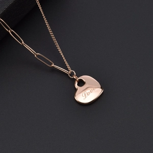 Rose gold heart pendant necklace with Love engraving and asymmetric chain design