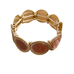 Elastic leopard print round bracelet with vintage gold finish and resin inlays