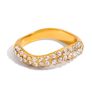 Detail of a wavy gold stainless steel ring featuring multi-row white zircon stones