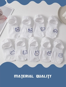 Detailed macro view of 10 pairs white cotton socks with various cute cartoon animal embroidery
