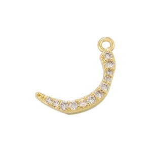 Detailed view of a gold crescent moon pendant with micro-inlaid clear cubic zirconia stones