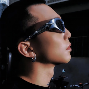 Futuristic silver metallic sunglasses with UV protection and a sleek geometric frame
