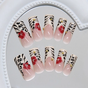 French leopard floral press-on nails set with 3D gold beads on a mirror surface