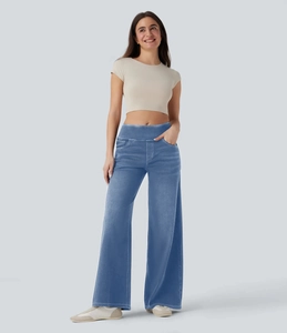Details der blauen High-Waist-Hose mit weitem Bein, Seitentasche und Reißverschluss