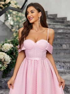 Pink off-shoulder corset dress with polka dot jacquard texture and ribbon straps