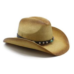 Classic straw western cowboy hat with turquoise beaded leather band on white background