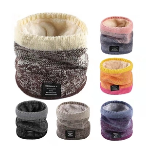 Close-up of winter knit neck warmer with soft fleece lining and gradient patterns