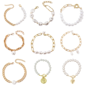Baroque pearl bracelet set for women featuring gold chains and heart coin pendants