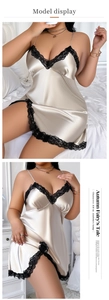 Detailed view of champagne silk nightgown featuring delicate black eyelash lace trim