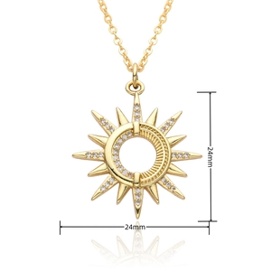 Macro shot of 24mm gold sunburst pendant with white cubic zirconia stones and dimensions