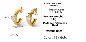 Detailed view of C-shaped 18k gold plated stainless steel heart crystal earrings