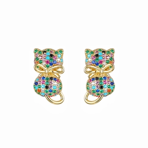 Detailed close-up of golden cat stud earrings with colorful zircon and tiny bow detail