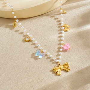 Charming pearl necklace with golden bows, colorful acrylic heart and butterfly charms